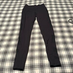 Size small black alo leggings with mesh up to he sides